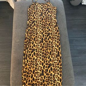 Leopard print dress. Lots of stretch. Multiple sizes available. Brand New.